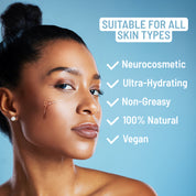 Confident woman with glowing skin and facial oil applied to her cheek, set against a blue background with text stating “Suitable for all skin types” and benefits listed: Neurocosmetic, Ultra-Hydrating, Non-Greasy, 100% Natural, Vegan.