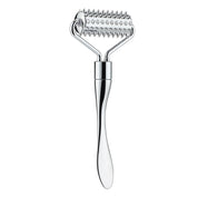 Close-up of a spiked facial roller in rose gold, highlighting its textured surface for enhanced skin rejuvenation.