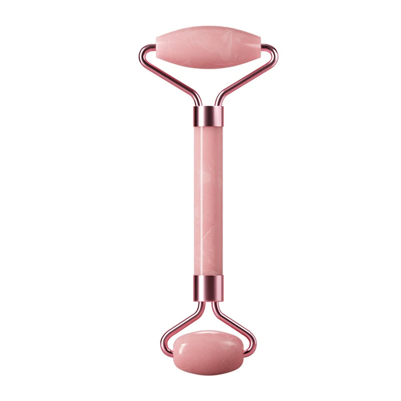 Pink jade facial roller featured in a product shoot, highlighting its smooth texture and elegant design for skincare and facial massage.
