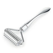 Silver facial roller with micro-spikes, captured at an angle to showcase its precision-engineered design for facial firming.