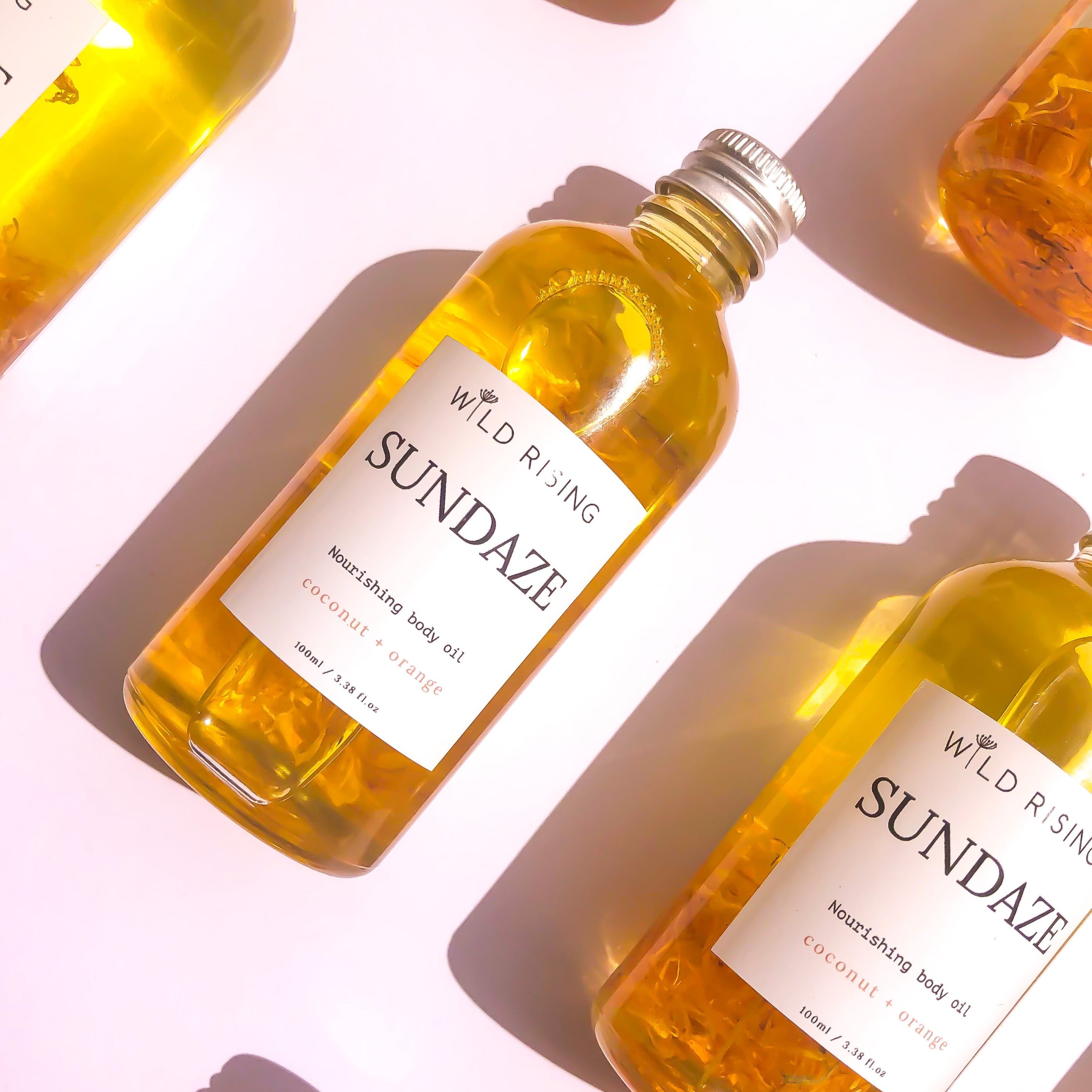 Sundaze - Olejek do ciała kokosowy i pomarańczowy