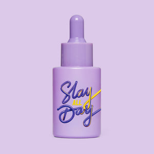 Studio image of HotChi’s Slay All Day Facial Oil on purple background, highlighting empowering, confidence-boosting benefits.