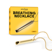 Gold breathing necklace with packaging on a white background