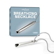 Silver breathing necklace with packaging on a white background