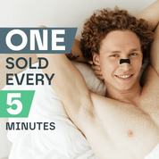 Man lying on a white pillow with a black nose strip, text 'ONE SOLD EVERY 5 MINUTES' displayed.